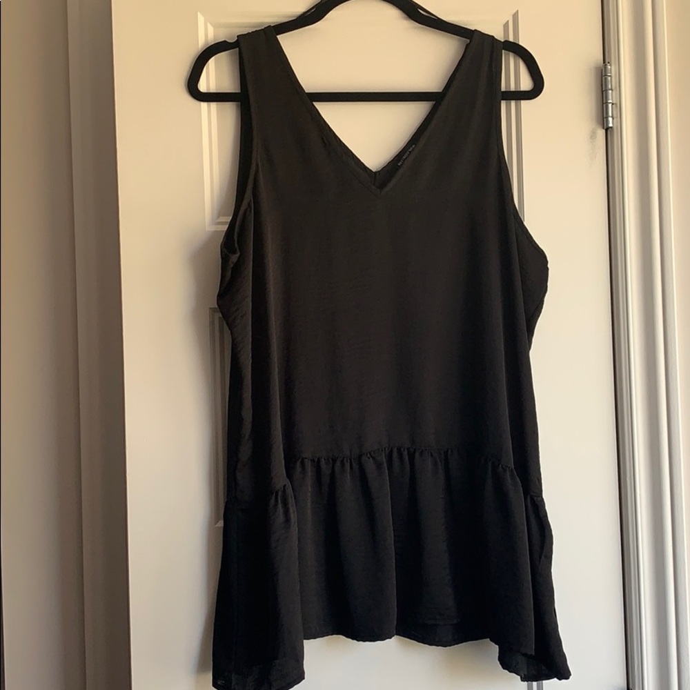 Peplum sleeveless blouse in satin